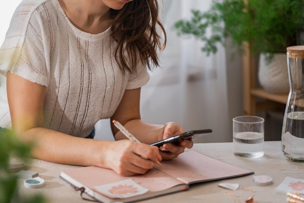 girl planing a week at home office in bright room