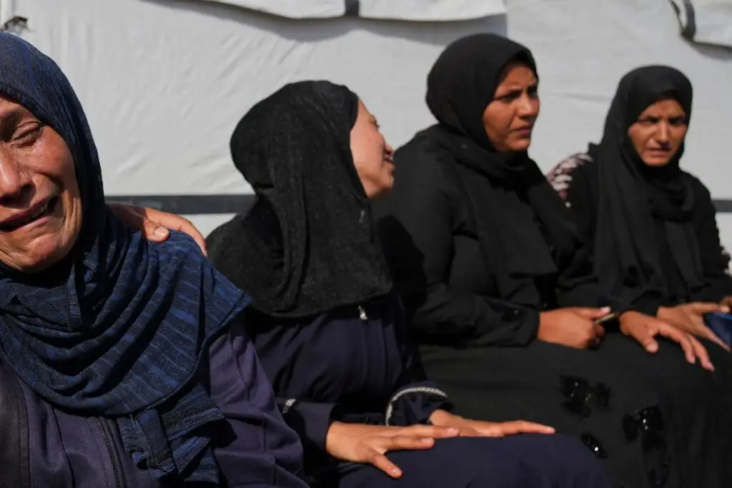 Palestinian women mourn their relatives killed in an Israeli army strike in Khan Younis, Gaza Strip, Saturday, May 3, 2025. (AP Photo/Abdel Kareem Hana)